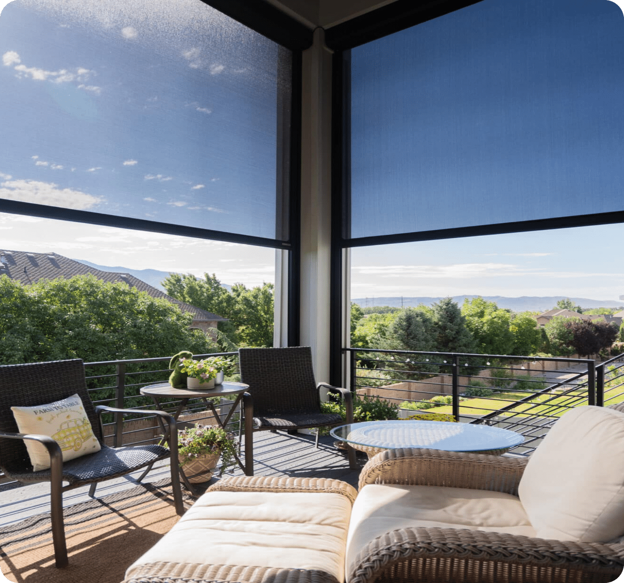 Covered patio with motorised screens open to the view